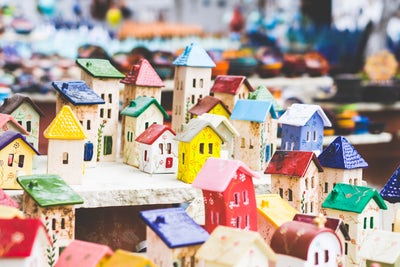 Roofs, representedby this miniature model of a neighbourhood, are at greater risk of damage in subtropical areas.