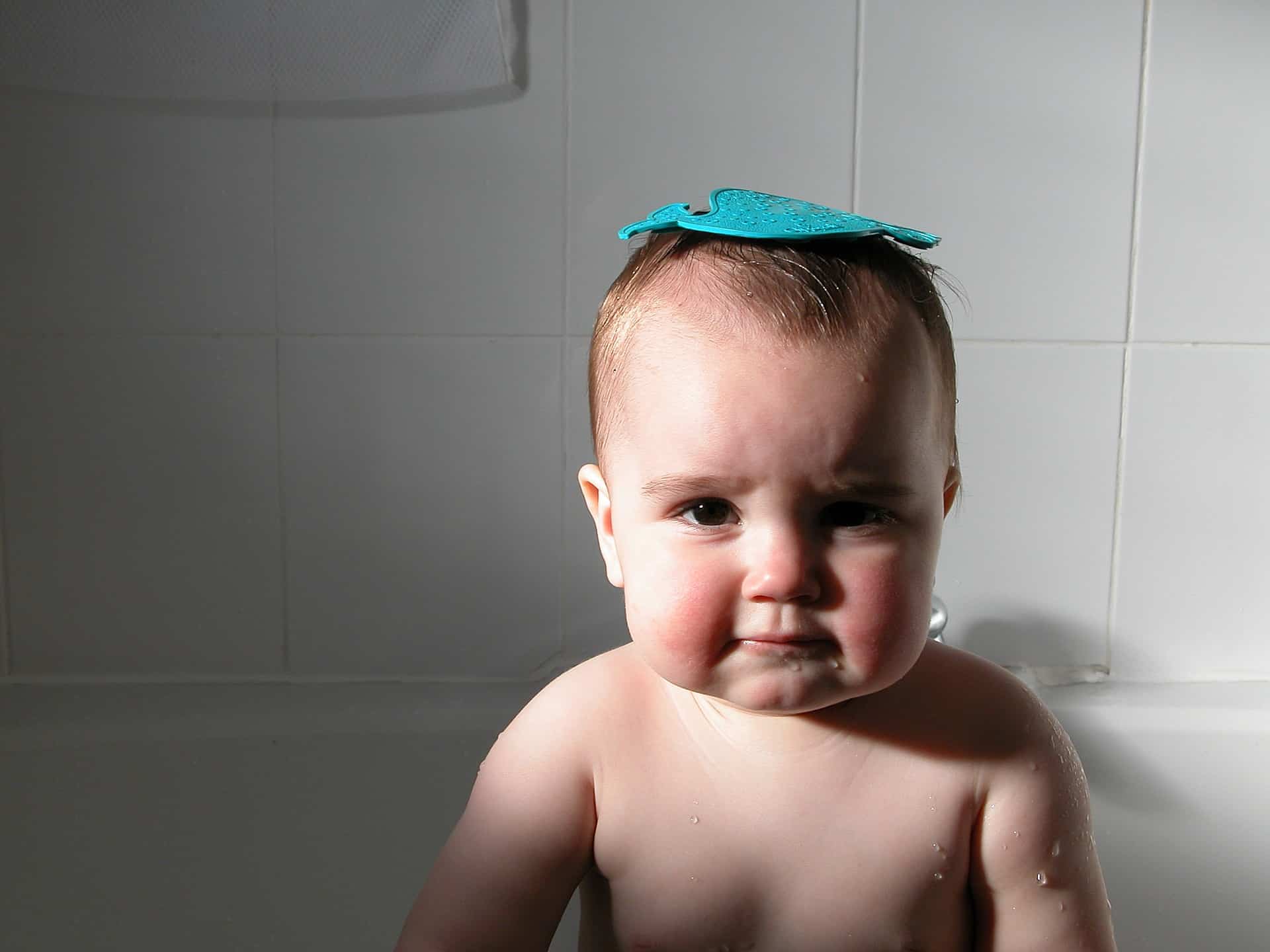 Kid in a bath tub
